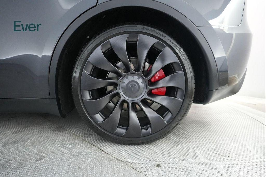 used 2025 Tesla Model Y car, priced at $43,299