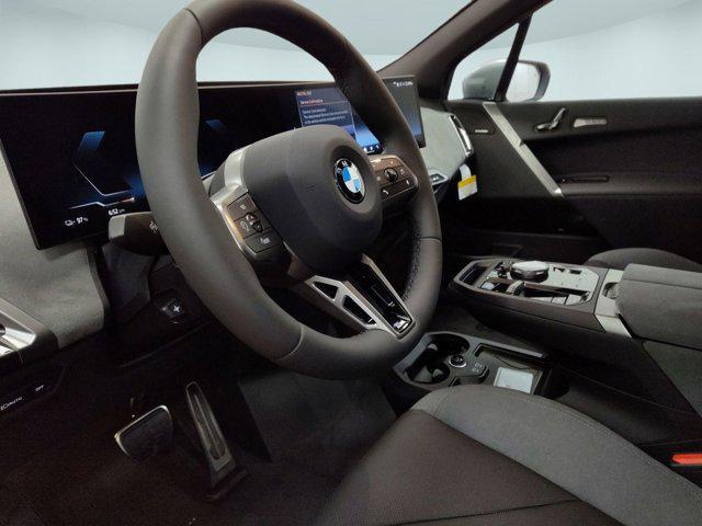 new 2026 BMW iX car, priced at $99,925
