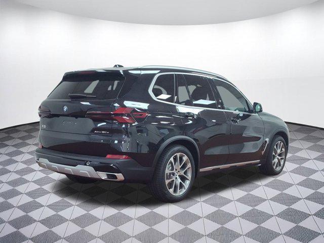 used 2026 BMW X5 PHEV car, priced at $68,262
