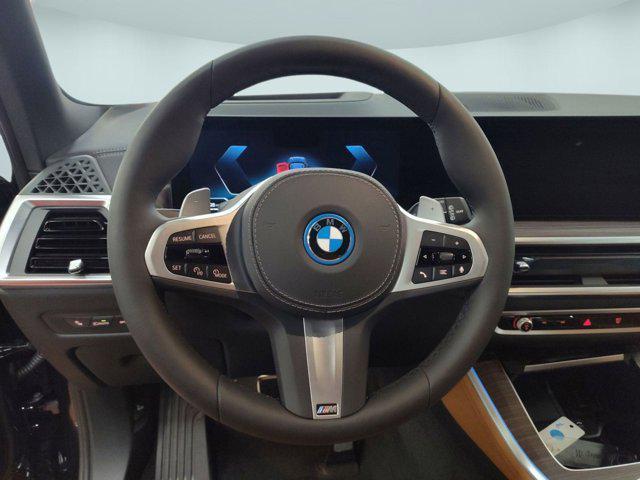 used 2026 BMW X5 PHEV car, priced at $68,523