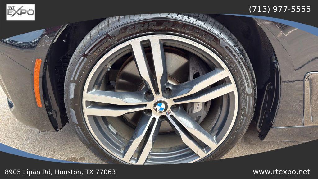 used 2016 BMW 750 car, priced at $18,995