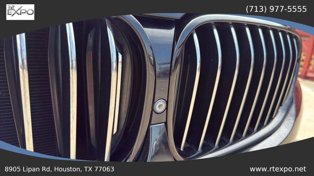 used 2016 BMW 750 car, priced at $18,995