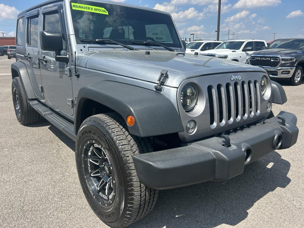 used 2015 Jeep Wrangler Unlimited car, priced at $18,945