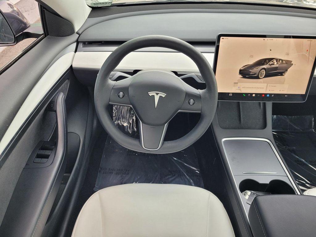 used 2023 Tesla Model 3 car, priced at $26,998