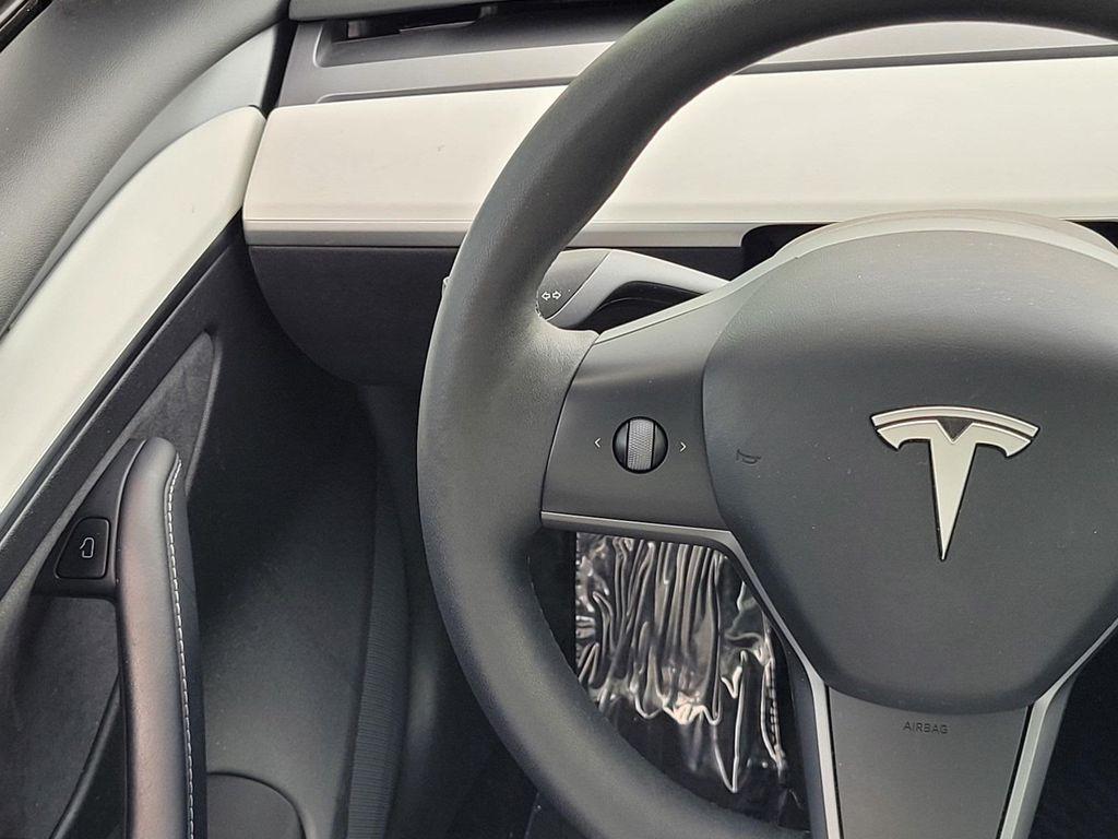 used 2023 Tesla Model 3 car, priced at $26,998