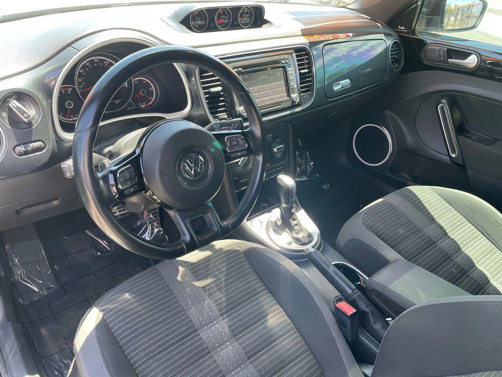 2014 White Volkswagen Beetle