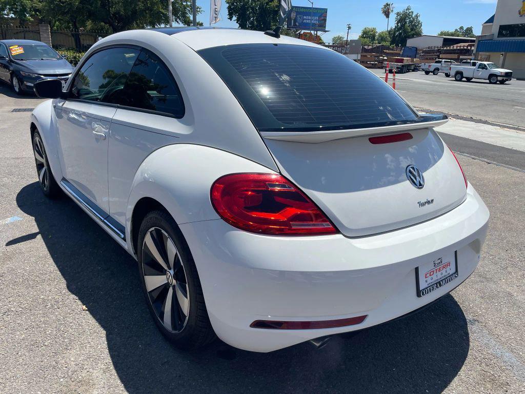 2014 White Volkswagen Beetle