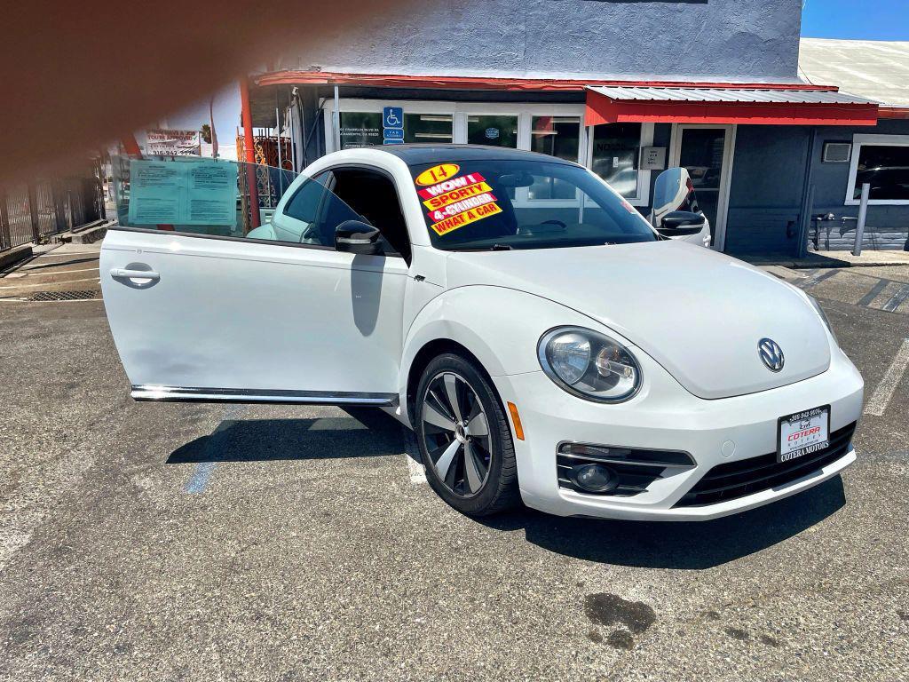 2014 White Volkswagen Beetle