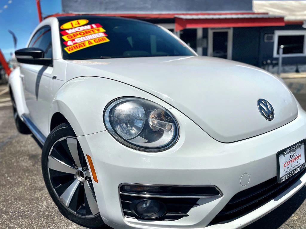 2014 White Volkswagen Beetle
