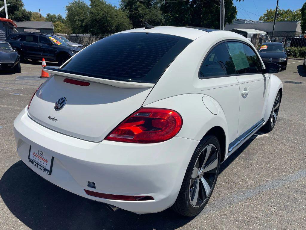 2014 White Volkswagen Beetle