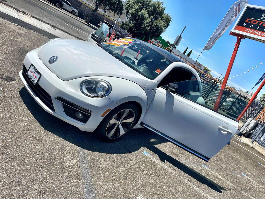 2014 White Volkswagen Beetle