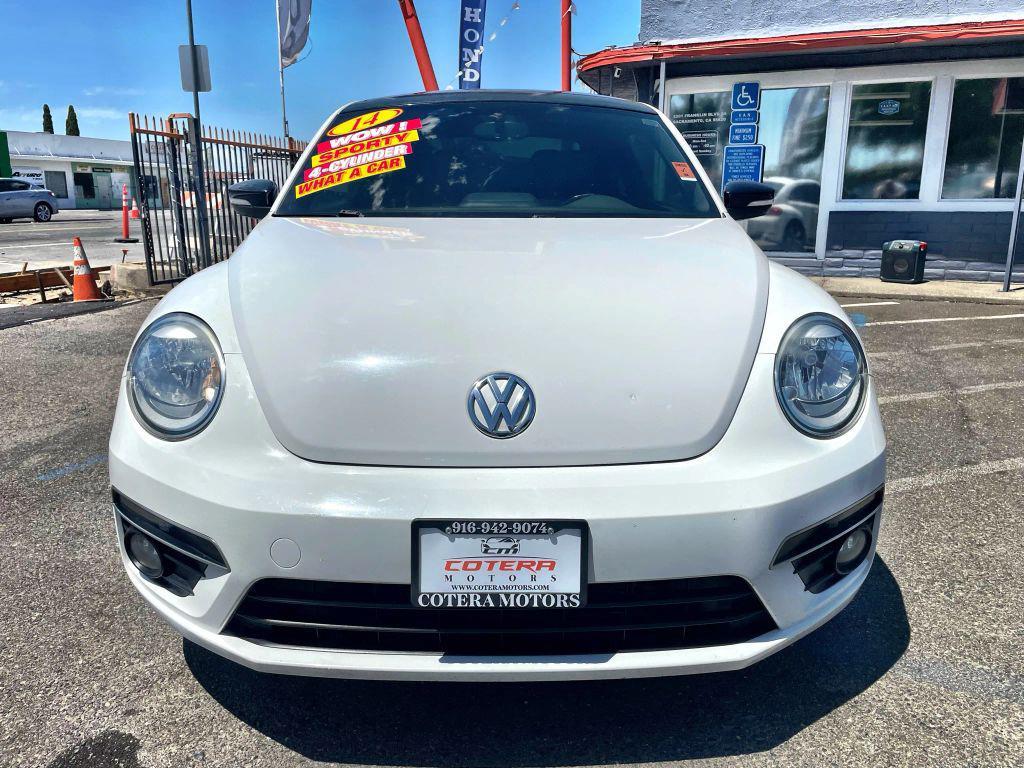 2014 White Volkswagen Beetle