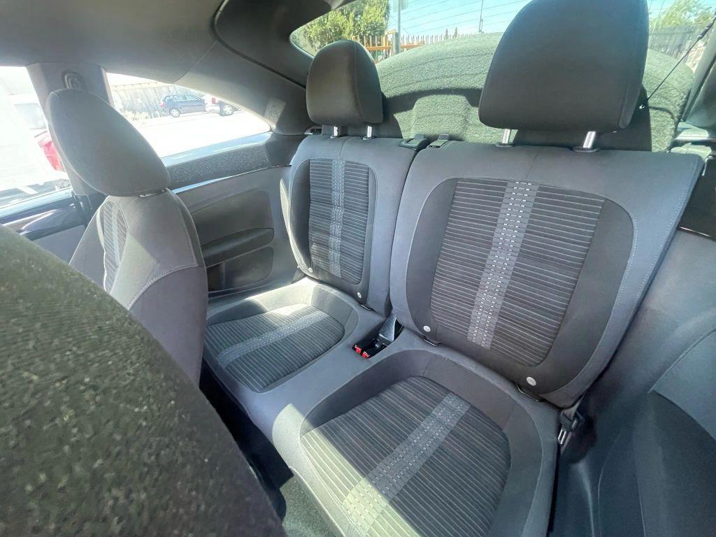 2014 White Volkswagen Beetle