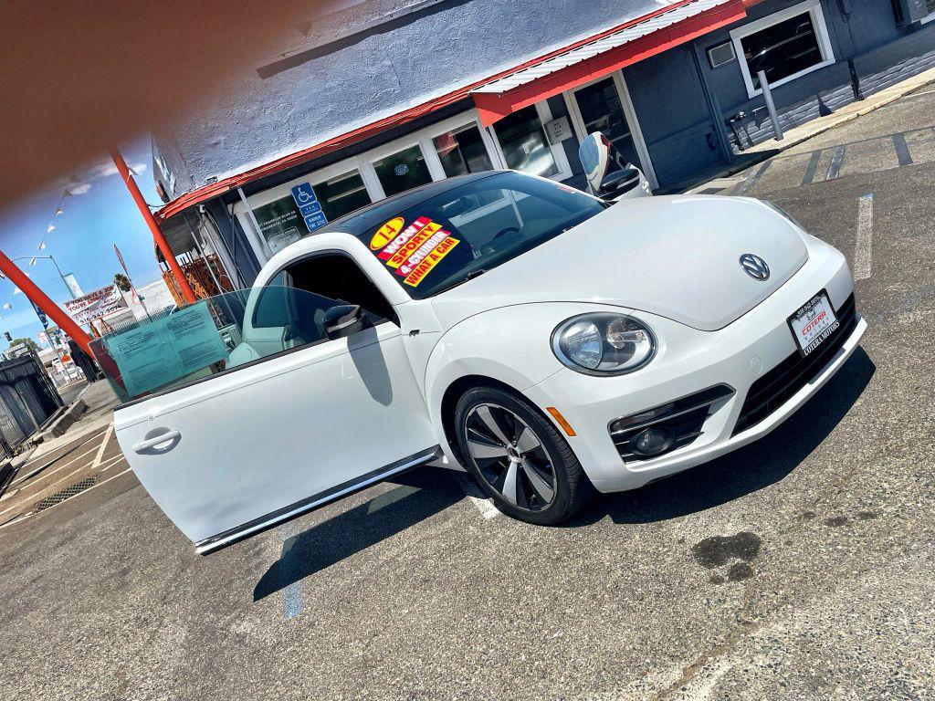 2014 White Volkswagen Beetle