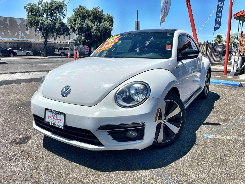 2014 White Volkswagen Beetle