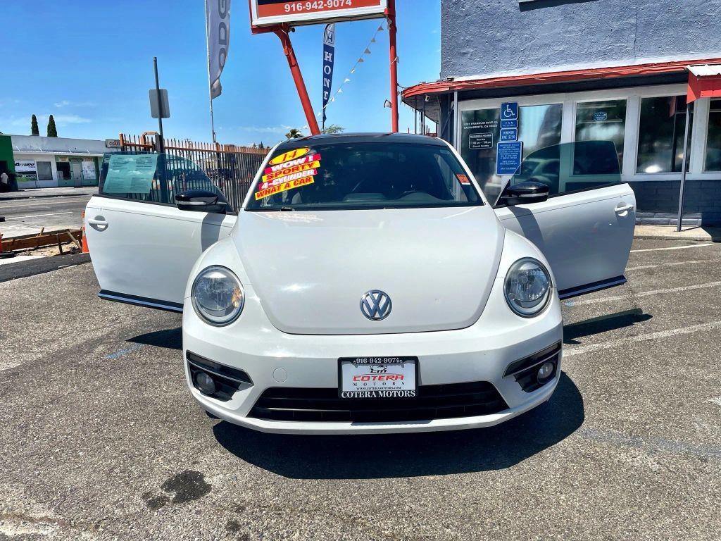 2014 White Volkswagen Beetle