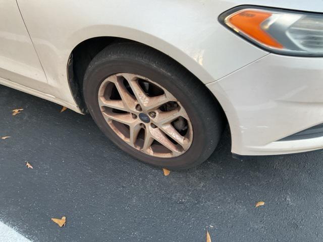 used 2014 Ford Fusion car, priced at $7,080