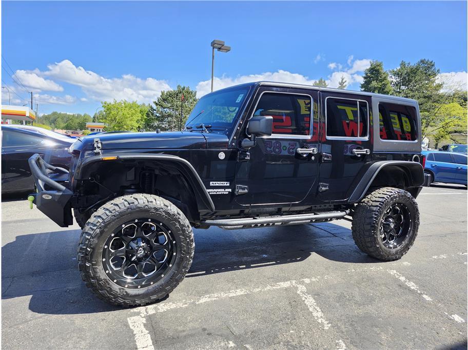 used 2013 Jeep Wrangler Unlimited car, priced at $12,750