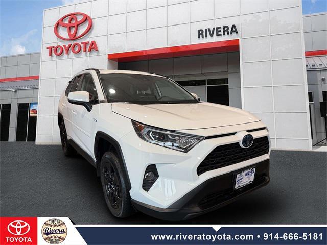 used 2021 Toyota RAV4 Hybrid car, priced at $27,595