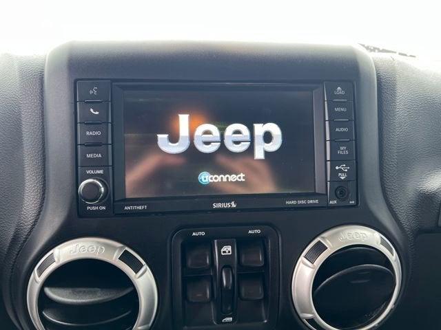 used 2017 Jeep Wrangler Unlimited car, priced at $23,991
