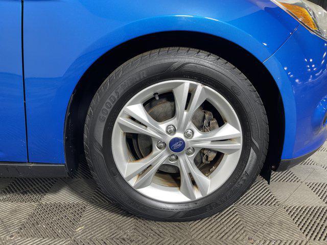 2014 Blue Candy Tinted Clearcoat Ford Focus