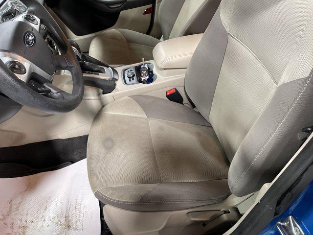 2014 Blue Candy Tinted Clearcoat Ford Focus