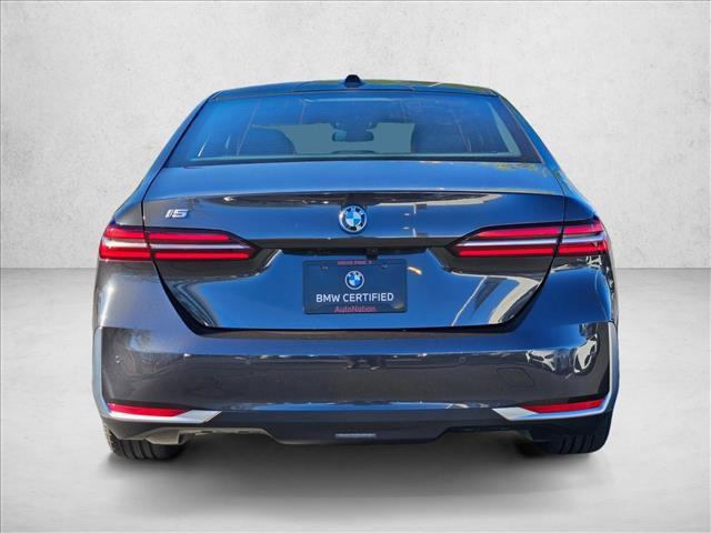 used 2025 BMW i5 car, priced at $59,977