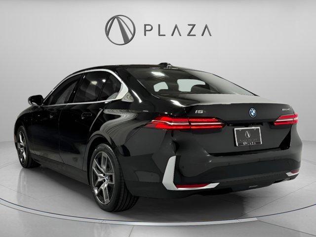 used 2025 BMW i5 car, priced at $56,750