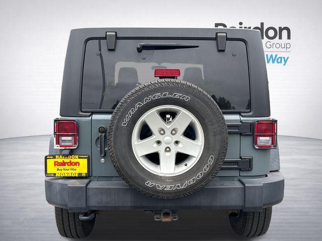 used 2014 Jeep Wrangler Unlimited car, priced at $14,990