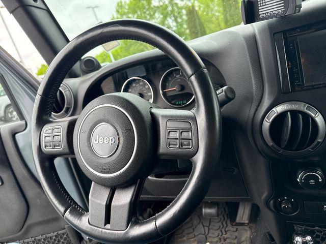 used 2014 Jeep Wrangler Unlimited car, priced at $14,990