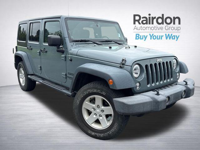 used 2014 Jeep Wrangler Unlimited car, priced at $14,990