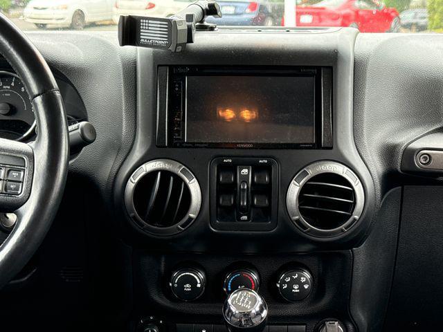 used 2014 Jeep Wrangler Unlimited car, priced at $14,990
