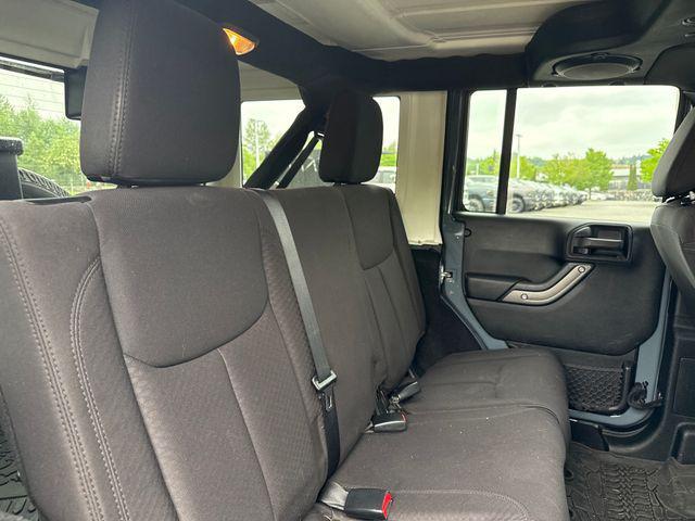 used 2014 Jeep Wrangler Unlimited car, priced at $14,990