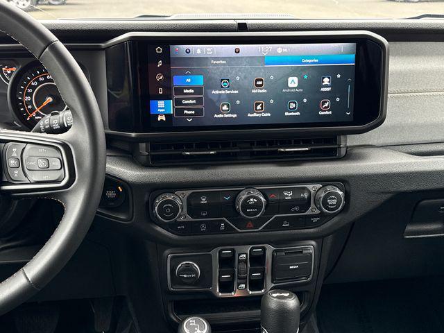 used 2024 Jeep Wrangler car, priced at $27,990