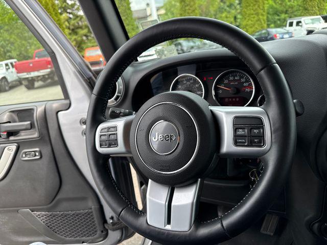 used 2015 Jeep Wrangler Unlimited car, priced at $23,690