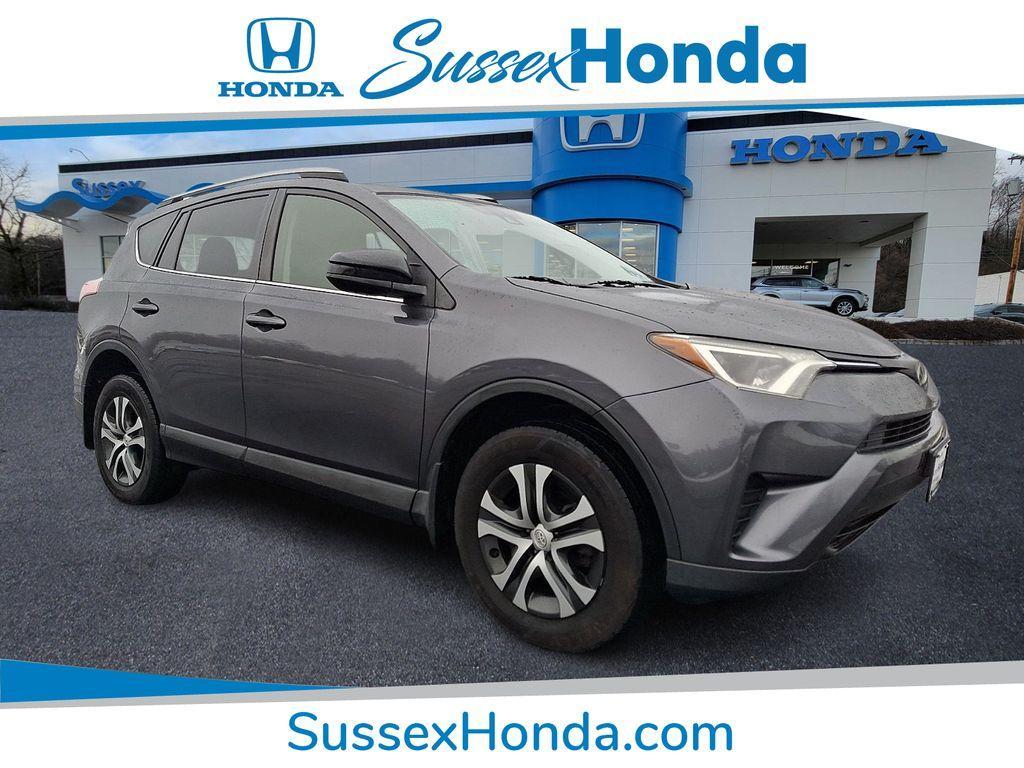 used 2018 Toyota RAV4 car, priced at $17,799