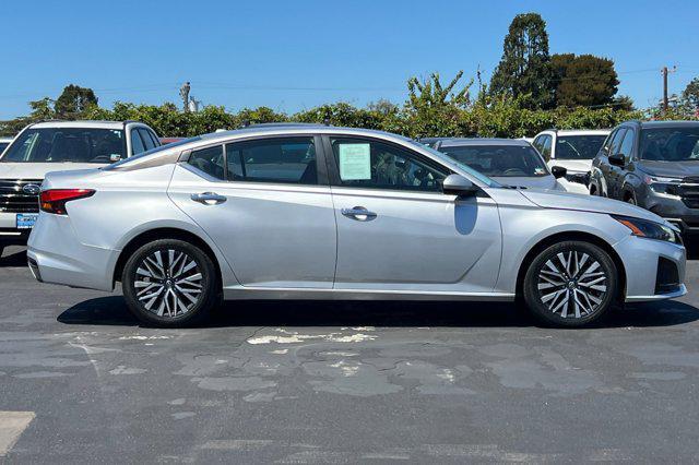 used 2023 Nissan Altima car, priced at $15,555