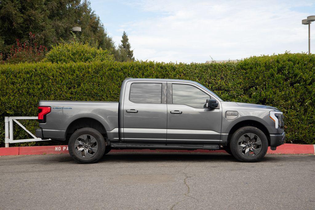 used 2023 Ford F-150 Lightning car, priced at $38,499