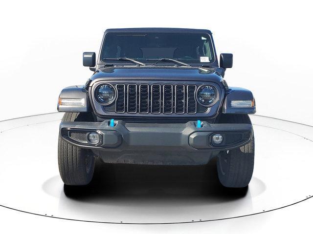 used 2024 Jeep Wrangler 4xe car, priced at $27,161