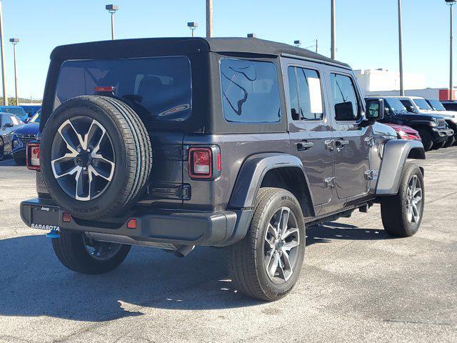 used 2024 Jeep Wrangler 4xe car, priced at $27,161