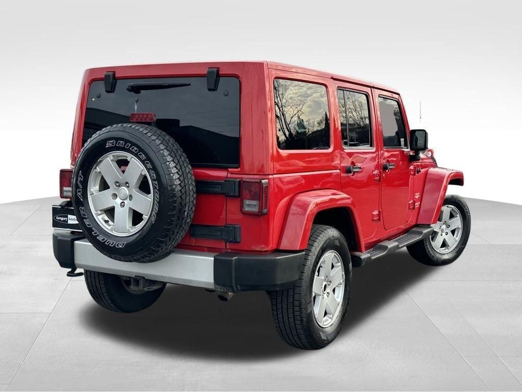 used 2011 Jeep Wrangler Unlimited car, priced at $10,894