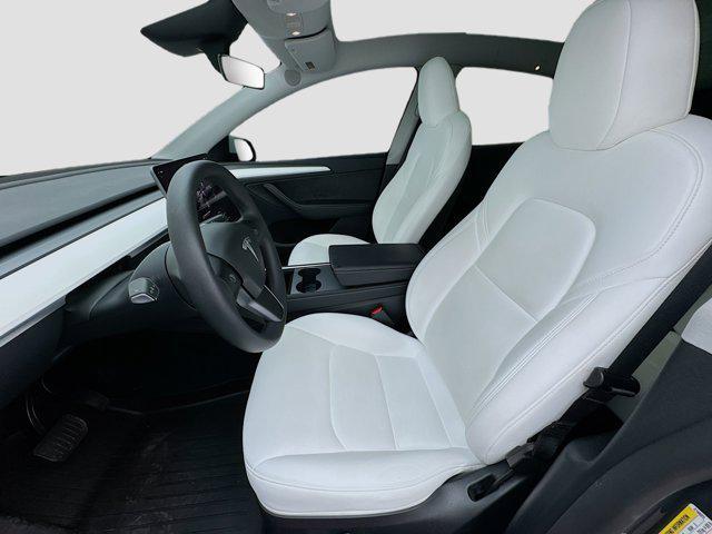 used 2024 Tesla Model Y car, priced at $32,670