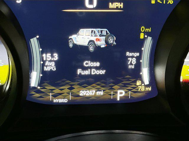 used 2024 Jeep Wrangler 4xe car, priced at $27,877