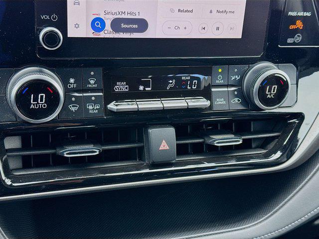 used 2023 Toyota Highlander Hybrid car, priced at $27,471