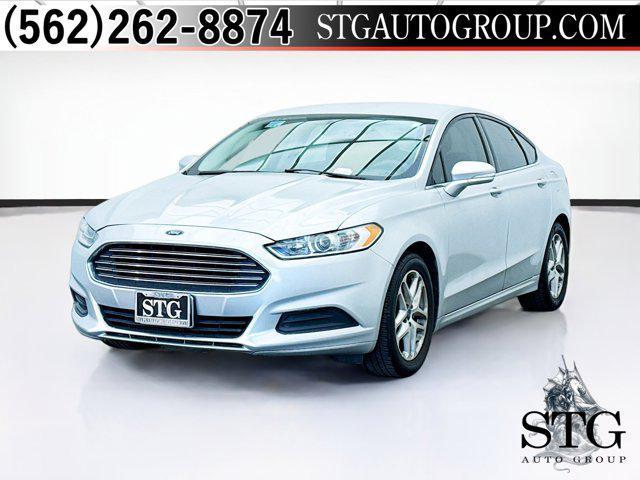 used 2014 Ford Fusion car, priced at $4,477