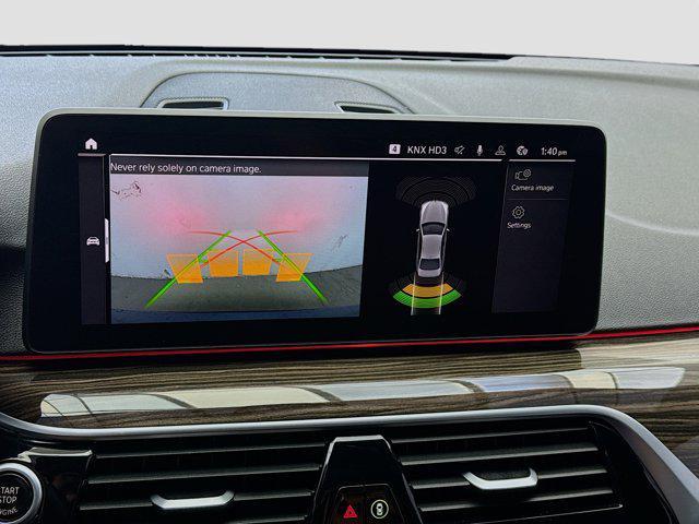used 2023 BMW 530e car, priced at $30,255
