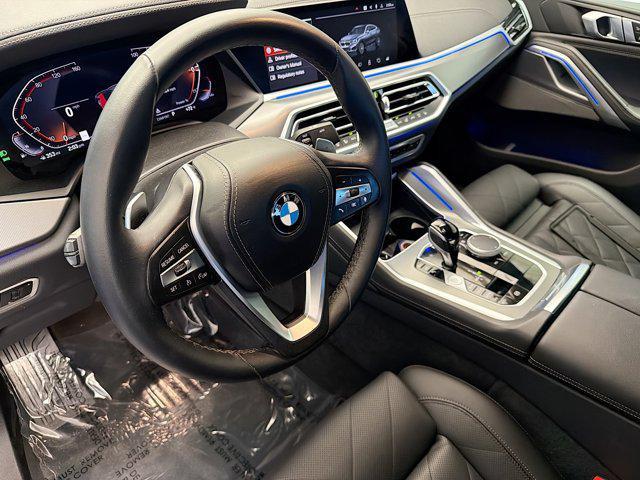 used 2023 BMW X6 car, priced at $51,450