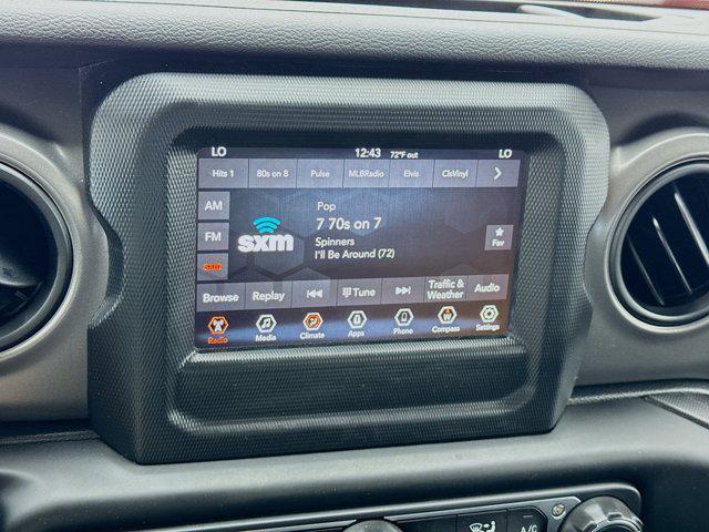 used 2023 Jeep Wrangler car, priced at $28,199