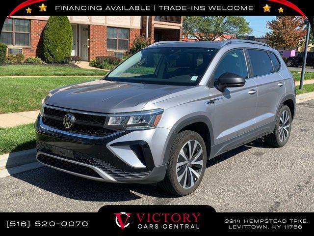 used 2023 Volkswagen Taos car, priced at $15,395