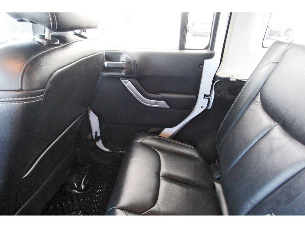 used 2013 Jeep Wrangler Unlimited car, priced at $12,991